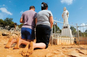 Rezando en el Podbro